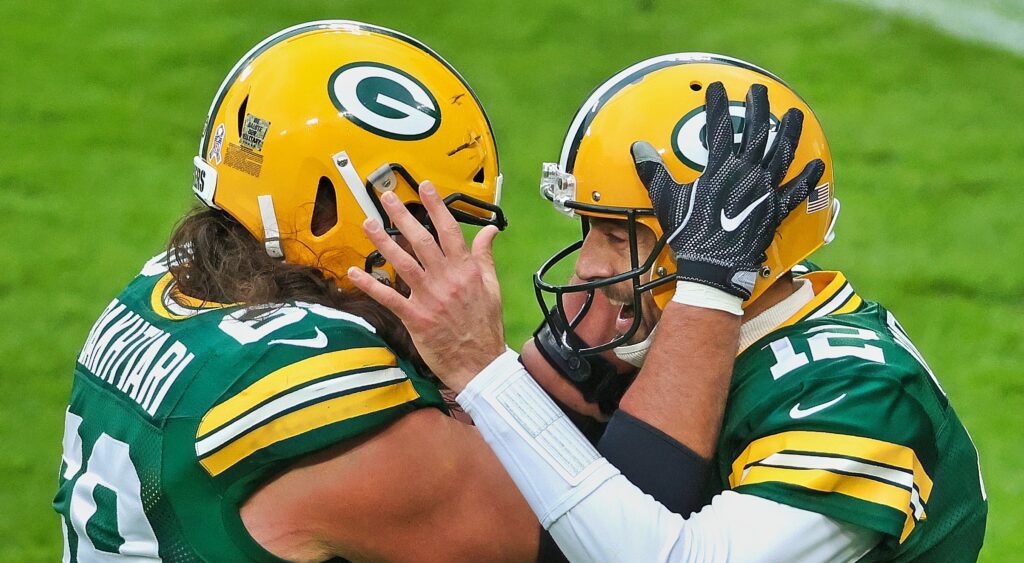 Aaron Rodgers and David Bakhtiari celebrate a touchdown.
