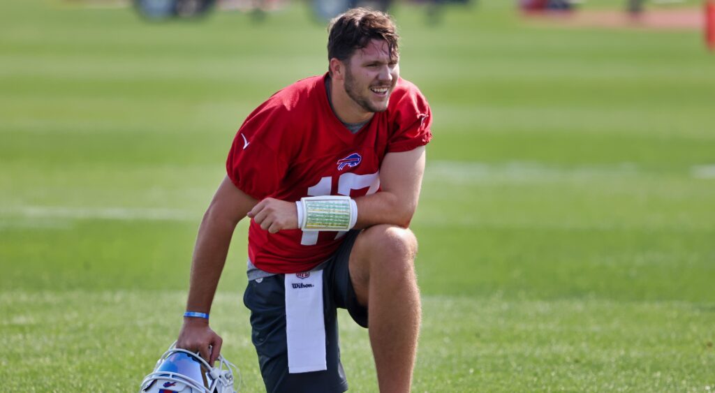 Josh Allen takes a knee at training camp.