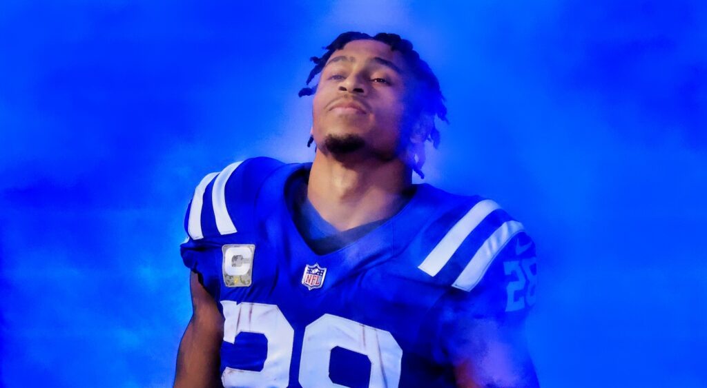 Jonathan Taylor of Indianapolis Colts running onto field.