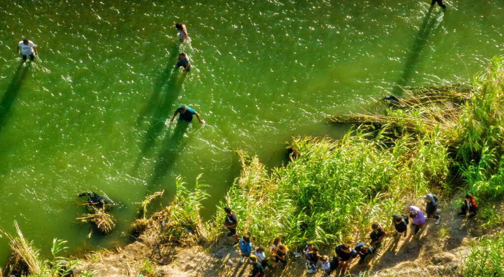 Aerial shot of people in and around a river