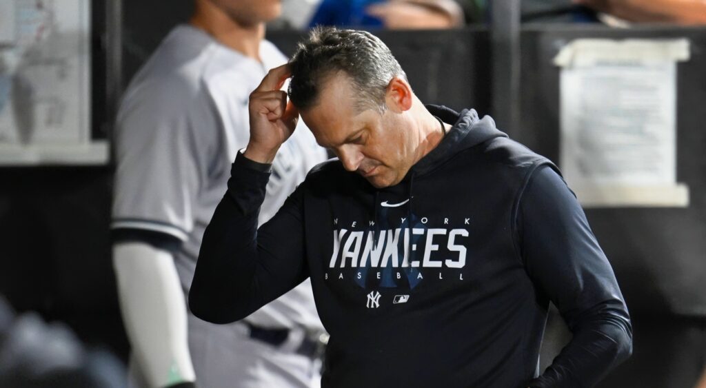 Aaron Boone of New Yok Yankees reacts after being ejected.