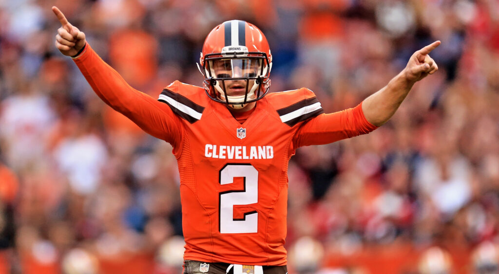 Johnny Manziel with his hands in the air