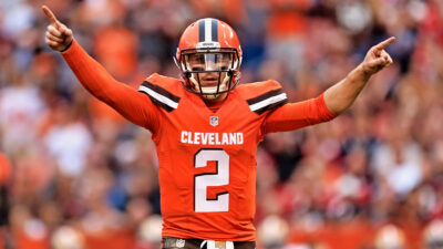 Johnny Manziel with his hands in the air