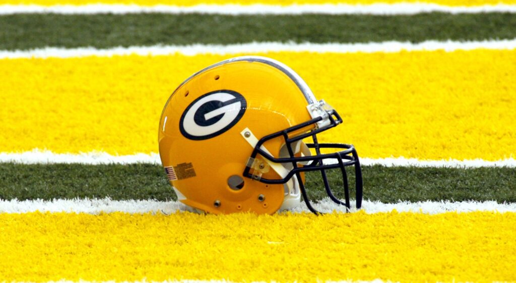 A Packers helmet on the field.