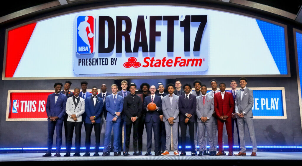 Draftees all pose for a photo on stage before the 2017 NBA Draft.
