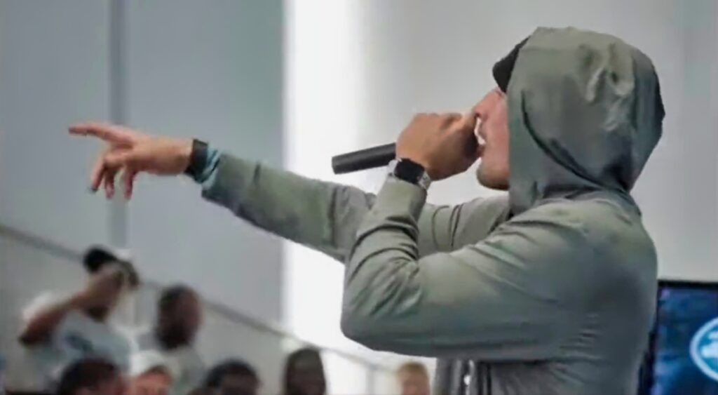 Jets' Jerome Kapp raps at a meeting.