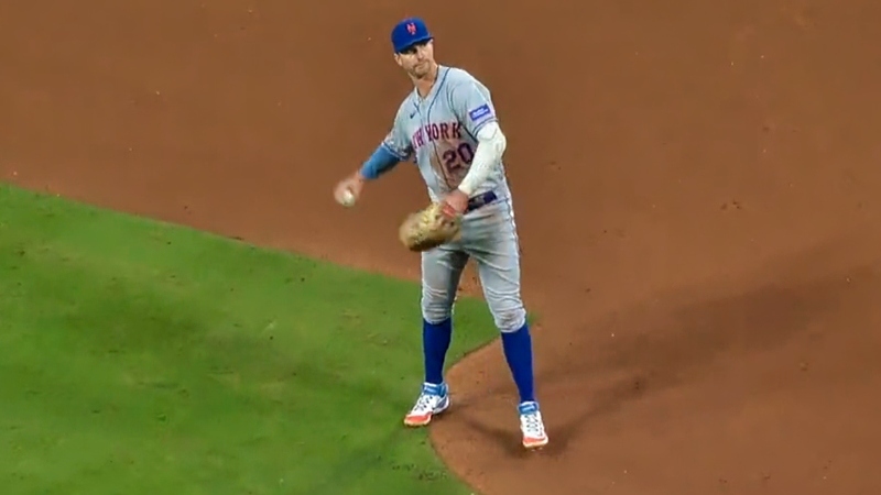 Pete Alonso of New York Mets throwing a baseball into stands.