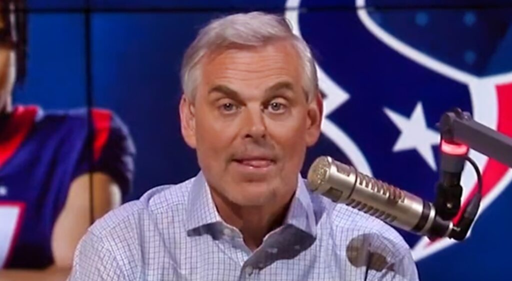 Colin Cowherd in front of microphone