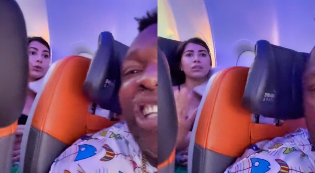 Warren Sapp and a lady on airline