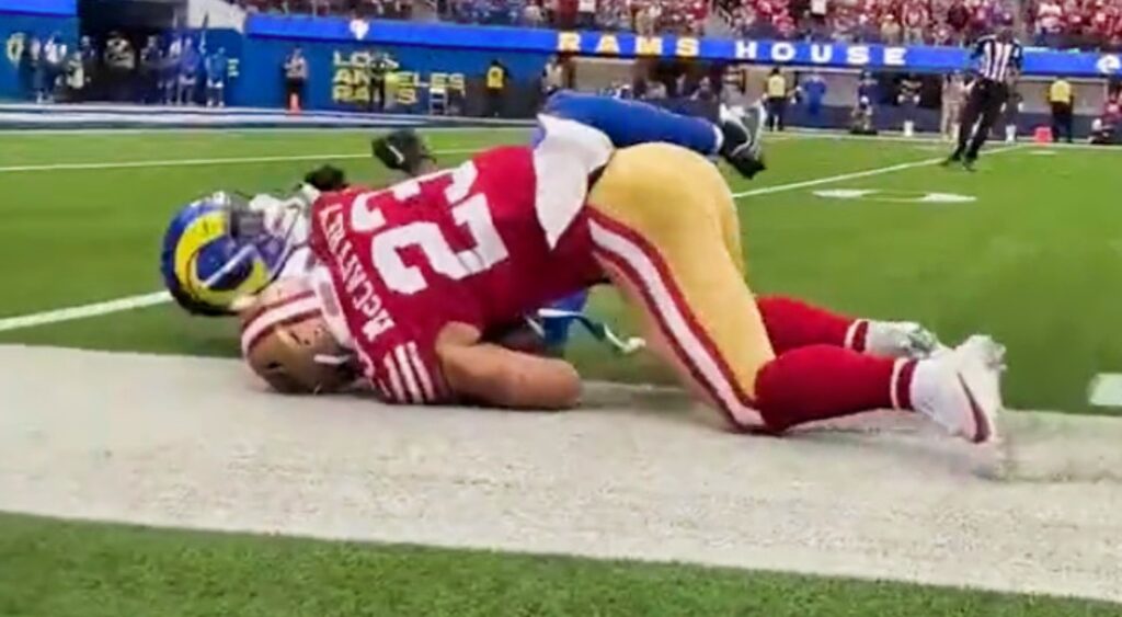 Sideline view of Christian McCaffrey getting tackled against the Rams.