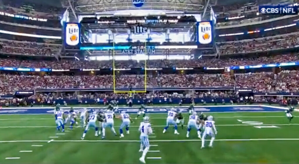 Dak Prescott of Dallas Cowboys throwing football.