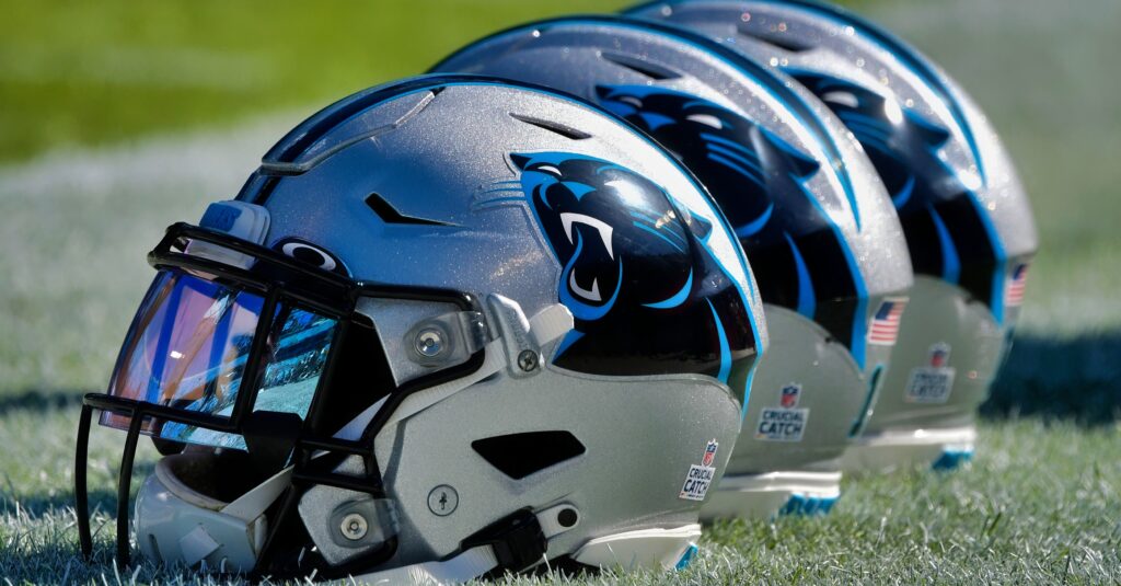 Carolina Panthers helmets on the field.