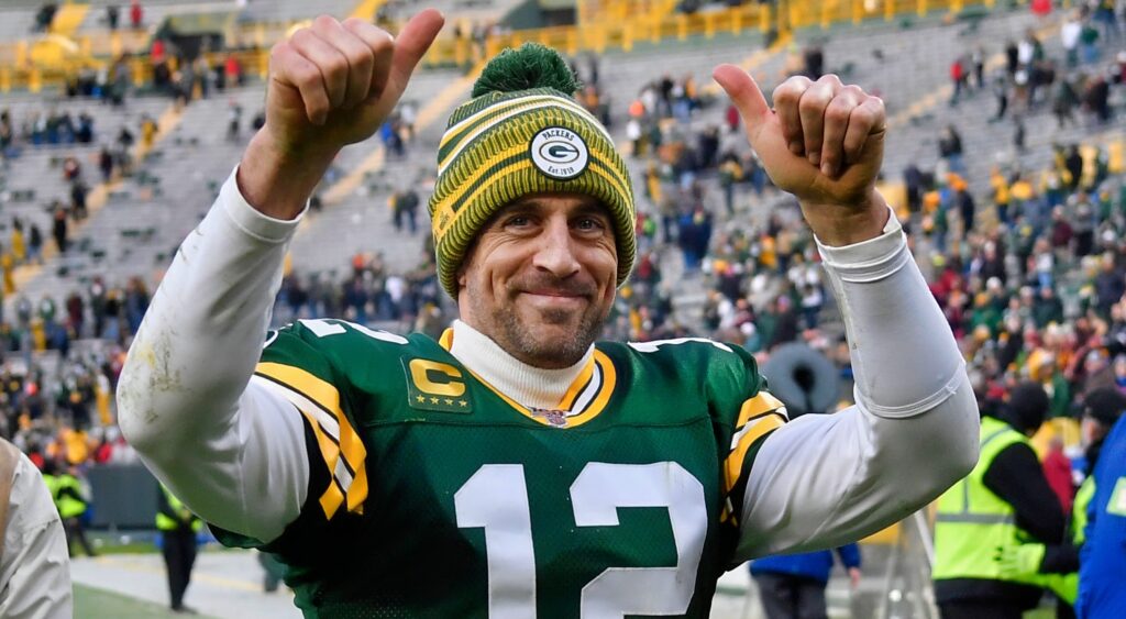 Aaron Rodgers gives the thumbs up after a game with the Packers.