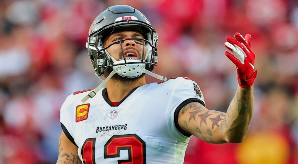 Mike Evans motions with his hand during a game.