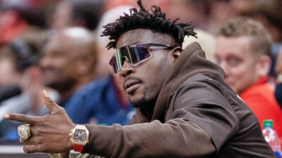 Antonio Brown with shades and jewelry