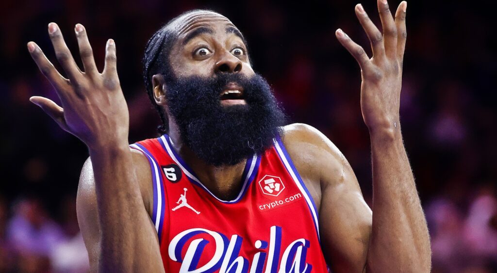 James Harden holds his hands up.