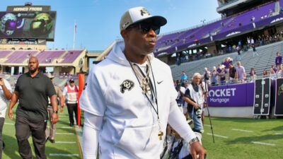 Deion Sanders walking out for Colorado debut