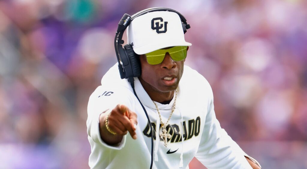 Deion Sanders of Colorado Buffaloes reacts after touching.