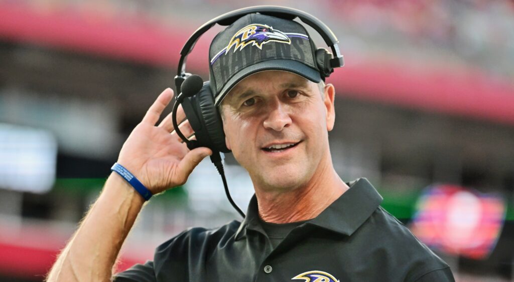 John Harbaugh with headset on
