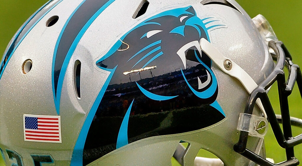 Carolina Panthers helmet on field.