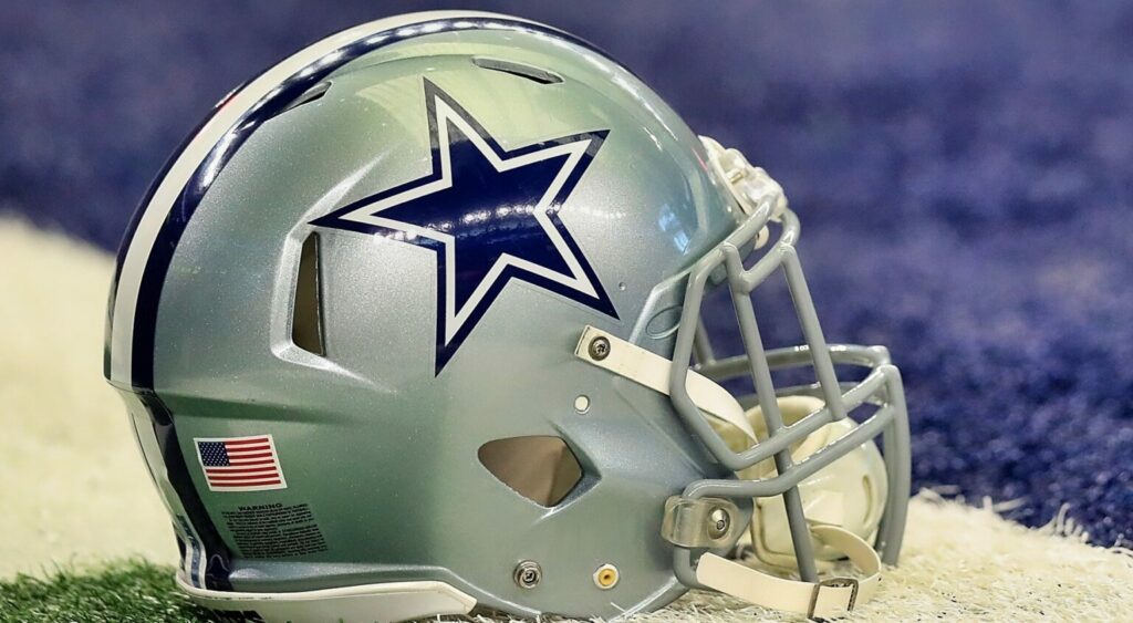 Dallas Cowboys' helmet shown on field.