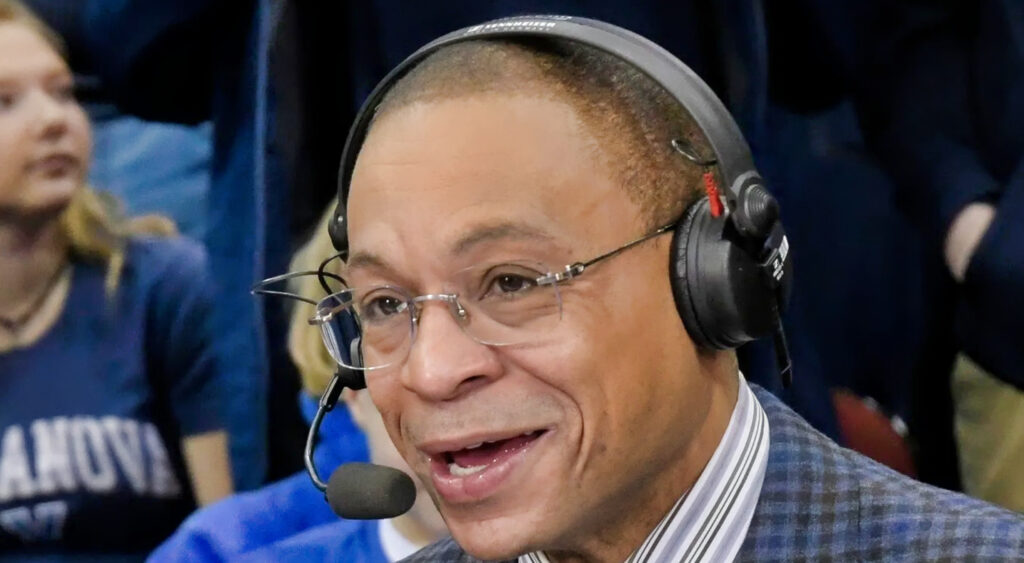 Gus Johnson with a headset on