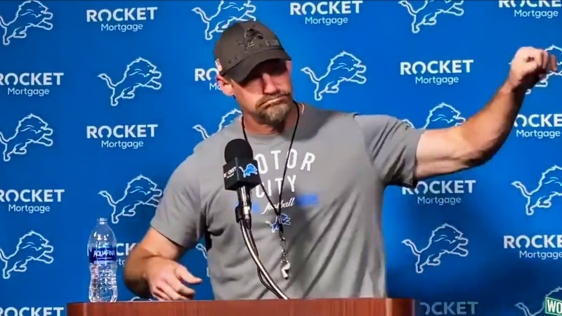 Detroit Lions' head coach Dan Campbell speaking at press conference.