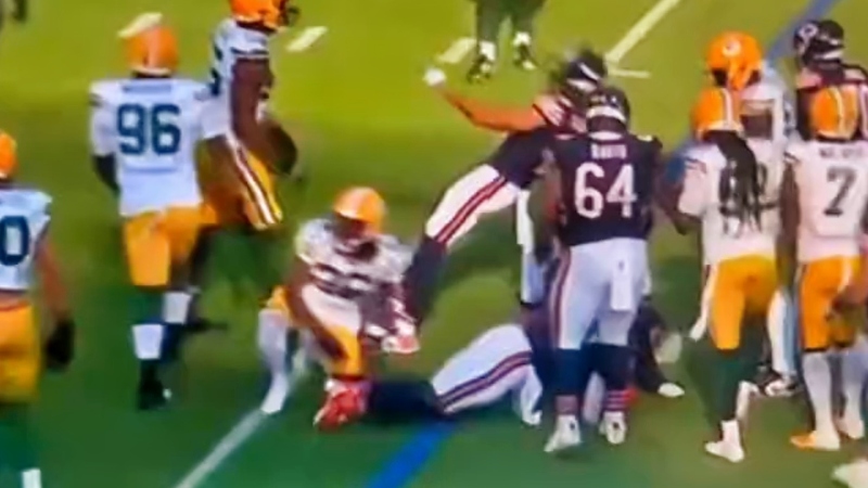 Chase Claypool of Chicago Bears falling down after.
