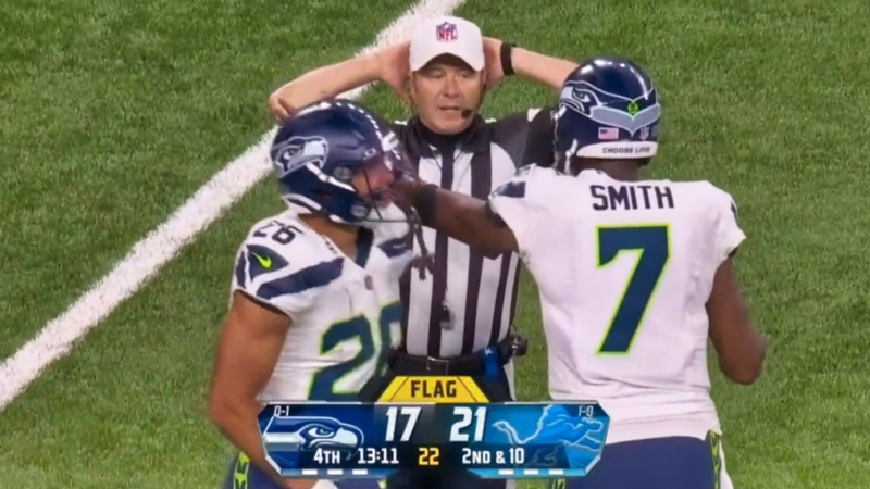 Geno Smith arguing with referee.