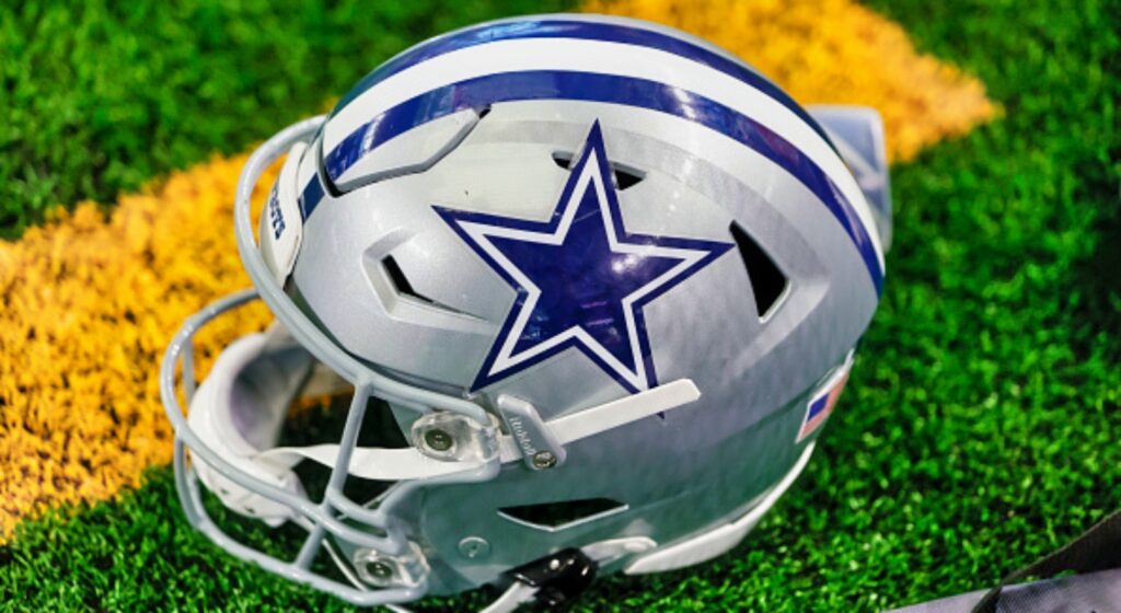 Dallas Cowboys helmet on the field.
