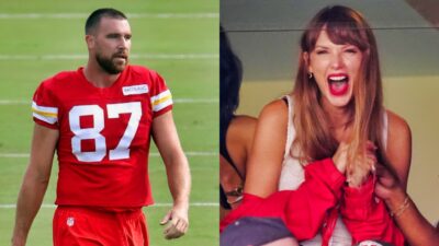Travis Kelce in uniform while Taylor Swift is smiling