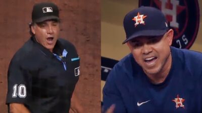 Umpire and Astros coach yelling