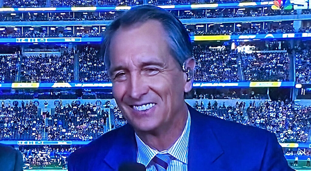 Cris Collinsworth in booth smiling