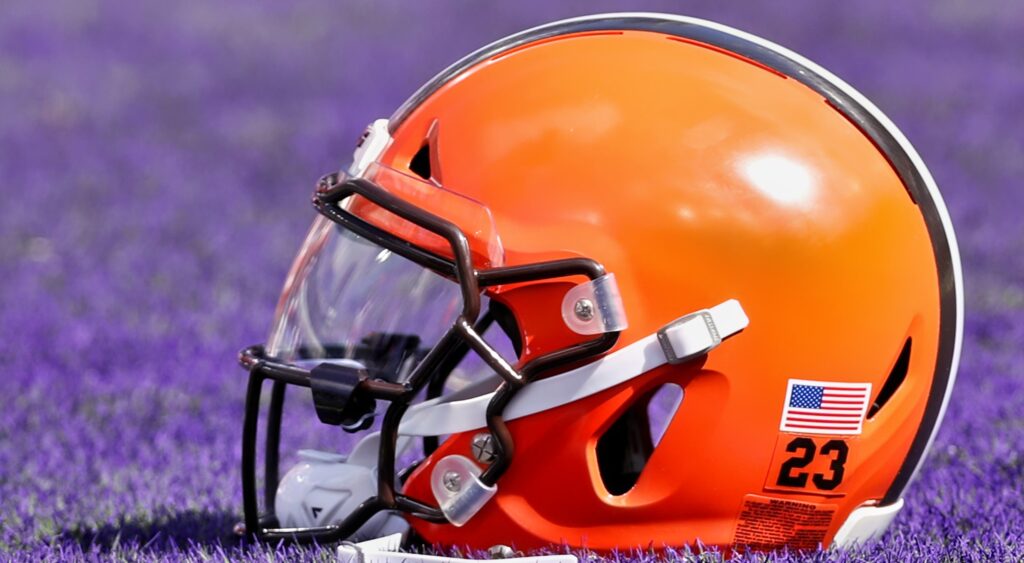 Cleveland Browns helmet on purple grass.