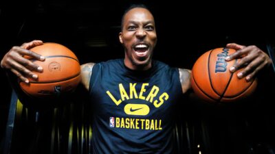 Dwight Howard holding two balls