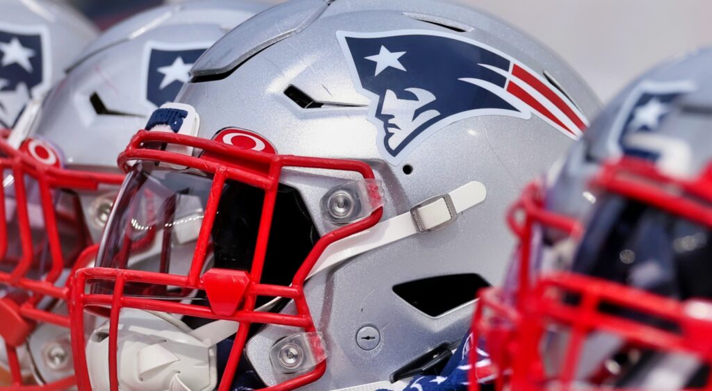 New England Patriots helmet on the bench.