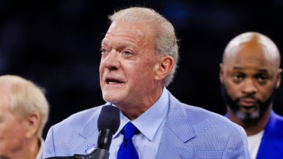 Jim Irsay speaking into a mic