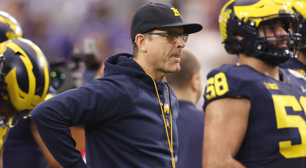 Jim Harbaugh on the sidelines coaching michiagn.