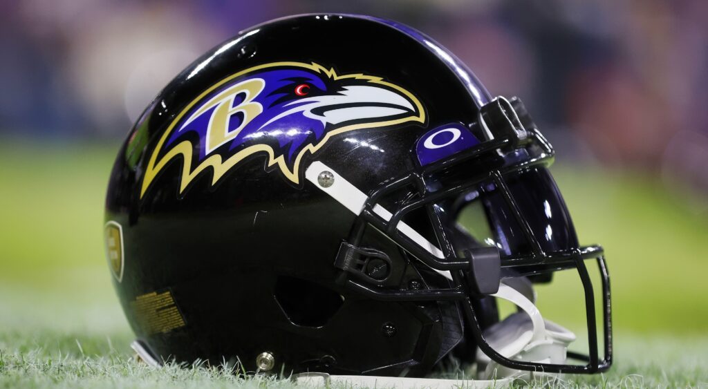 Baltimore Ravens' helmet shown on field.