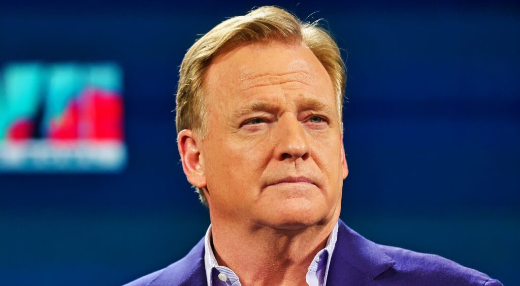 Roger Goodell looks on during a press conference.
