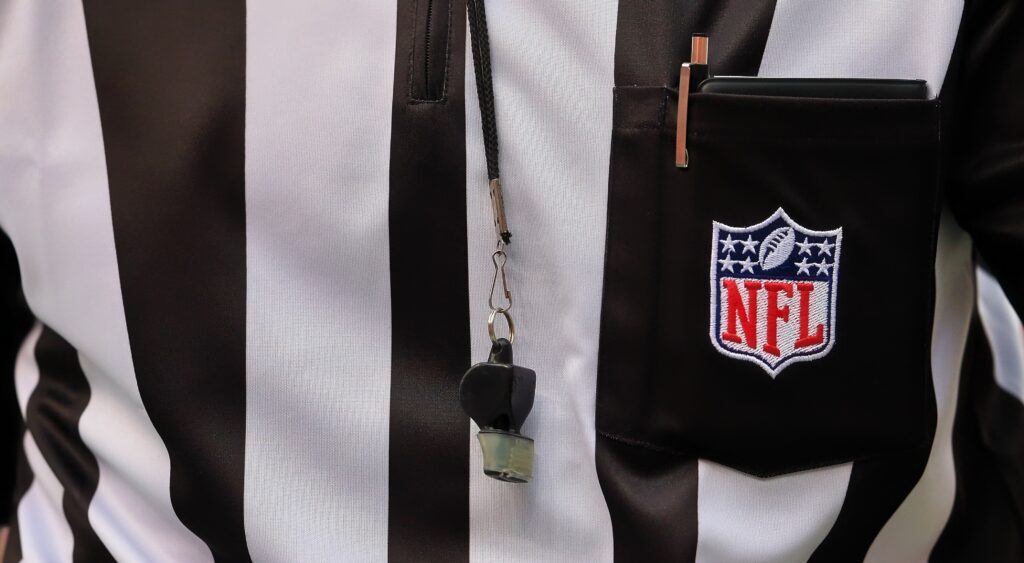 NFL ref's shirt and whistle.