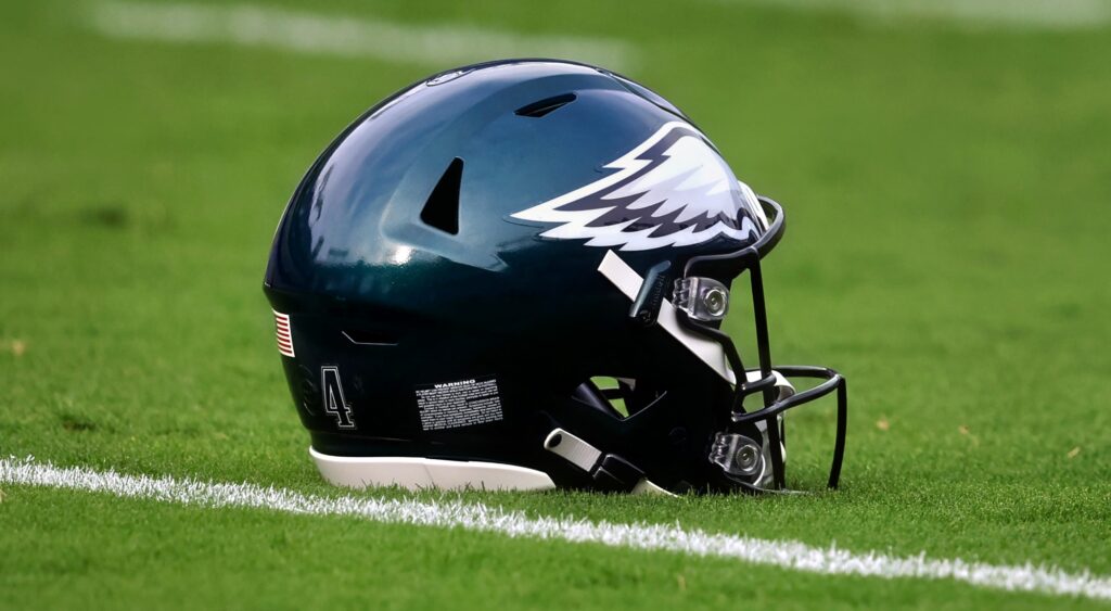 Philadelphia Eagles' helmet shown on ground.