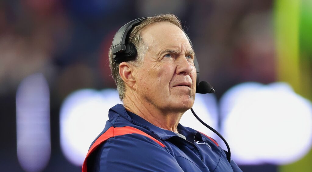 New England Patriots' head coach Bill Belichick looking on.