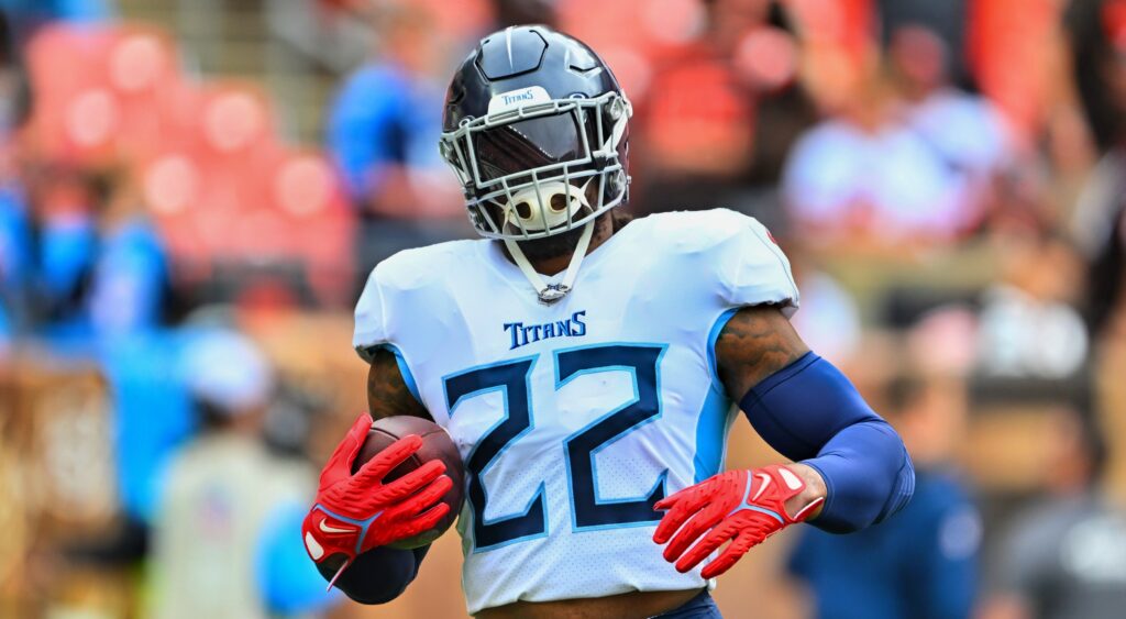 Derrick Henry of the Tennessee Titans warming up with football.