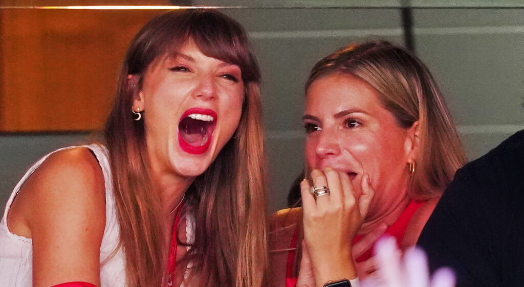 Taylor Swift laughing.
