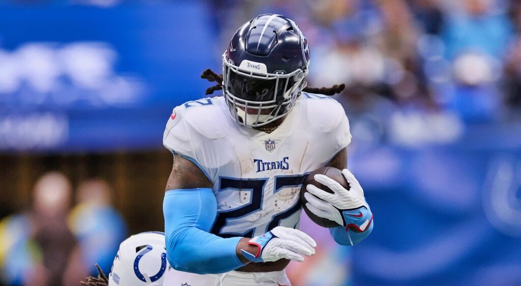Tennessee Titans running back Derrick Henry running with football.