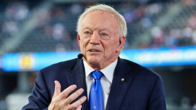 Jerry Jones speaking with a mic on