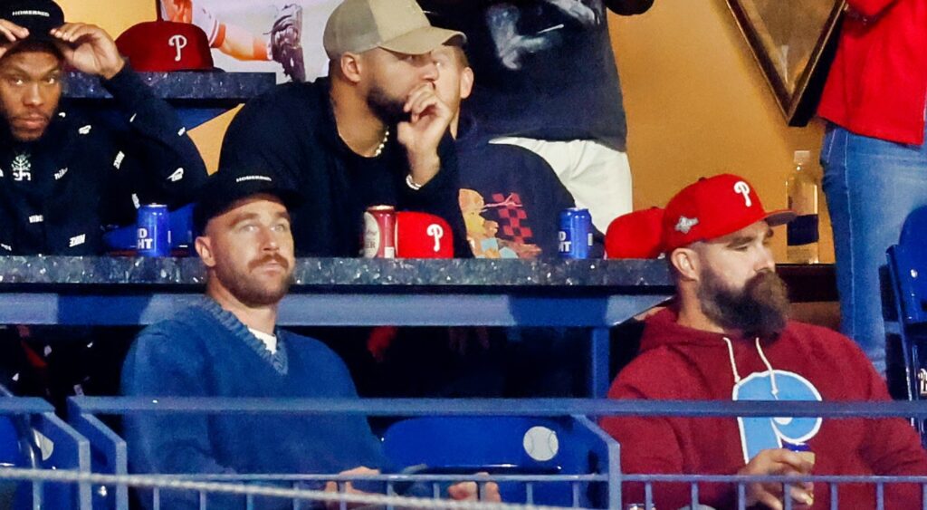 Travis and Jason Kelce sit in the stands during a Phillies game.