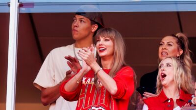 Taylor Swift and Jackson Mahomes in suite