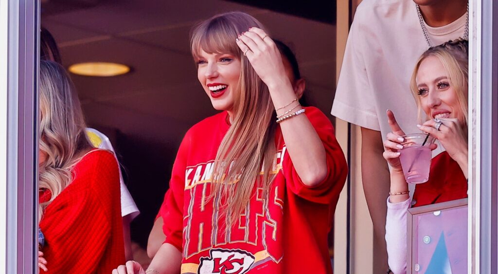 Taylor Swift and Brittany Mahomes looking on during Chiefs game.